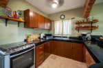 Fully-equipped kitchen with breakfast bar